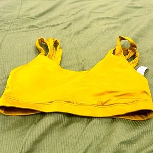 Gold color small Nike sportbra with padding